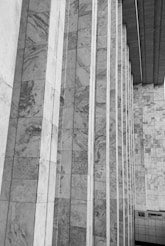 a black and white photo of a tall building