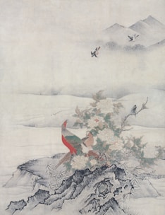 A traditional painting depicts a scene with a colorful pheasant standing on rocky terrain surrounded by blooming flowers and foliage. In the background, gentle hills fade into mist, while birds fly gracefully in the serene sky above.