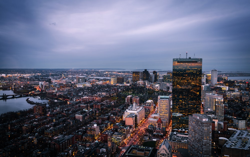 a view of a city at night from the top of a building