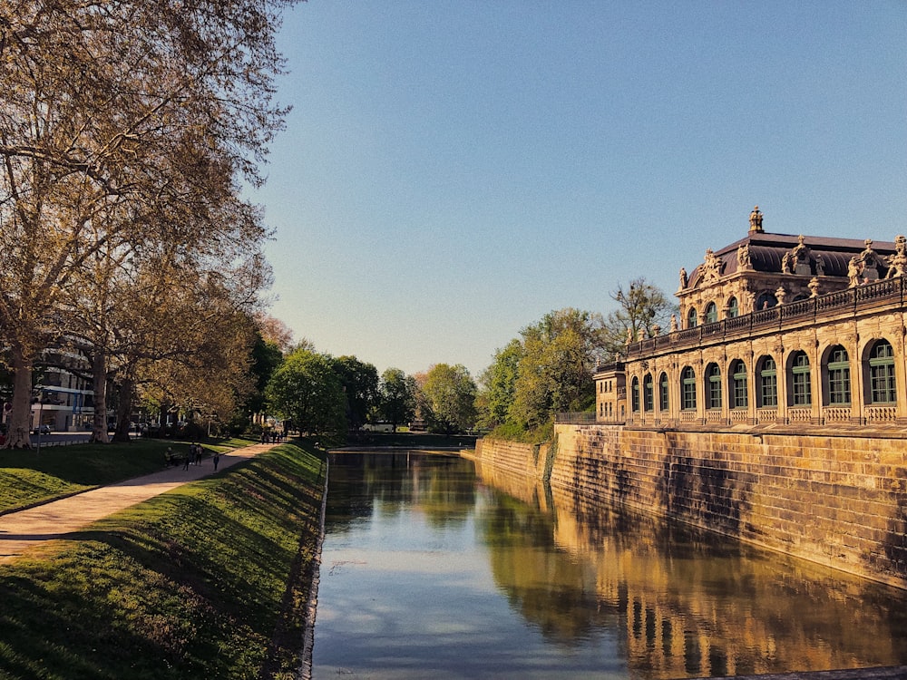 a river running through a lush green park