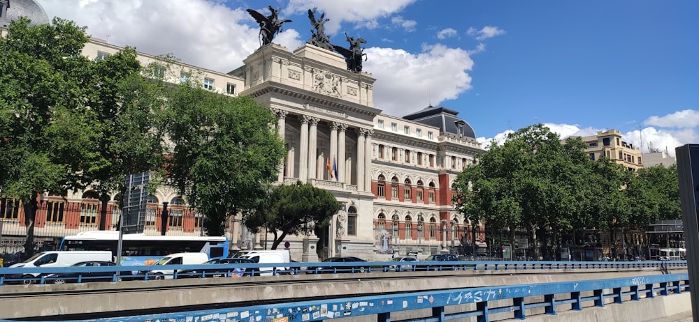 a large building with a statue on top of it