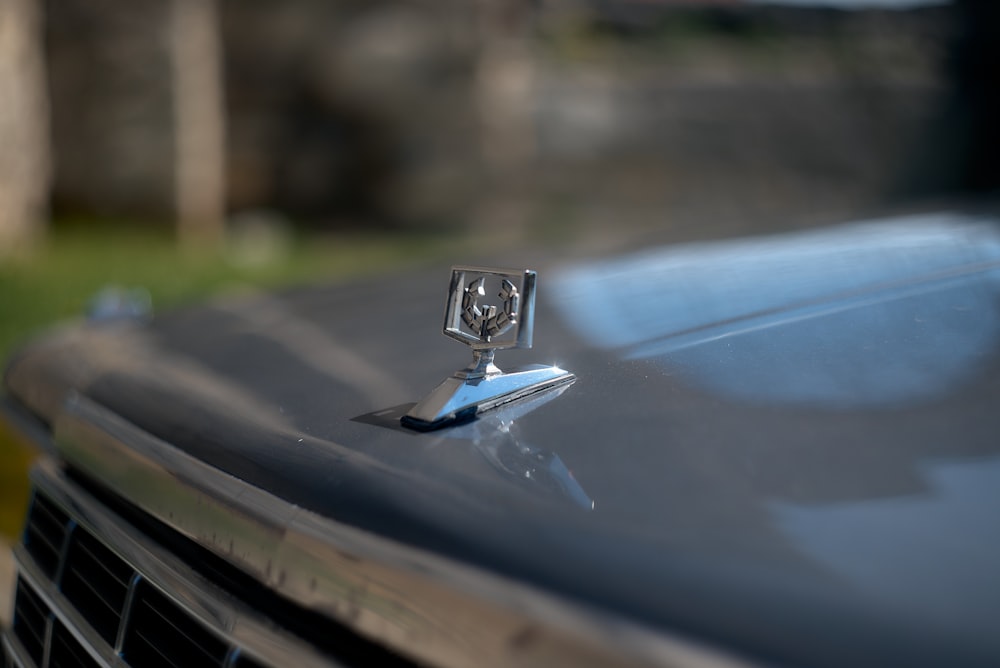 a close up of the hood ornament on a car