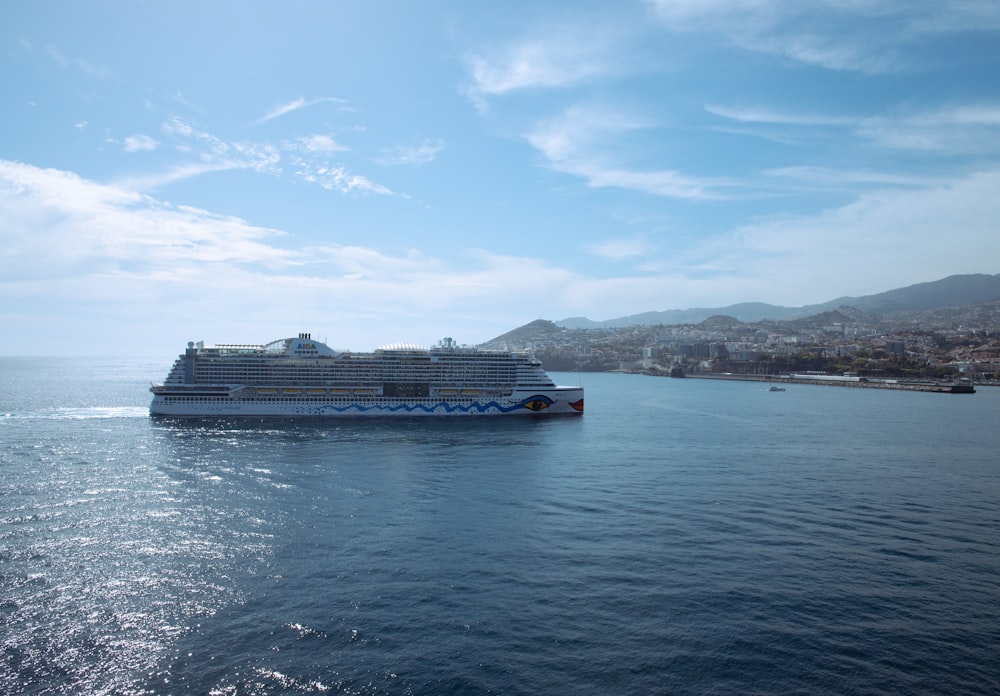 a large cruise ship in the middle of the ocean