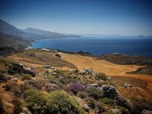 Panoramic shot of the rugged Sardinian coastline with crystal-clear sea