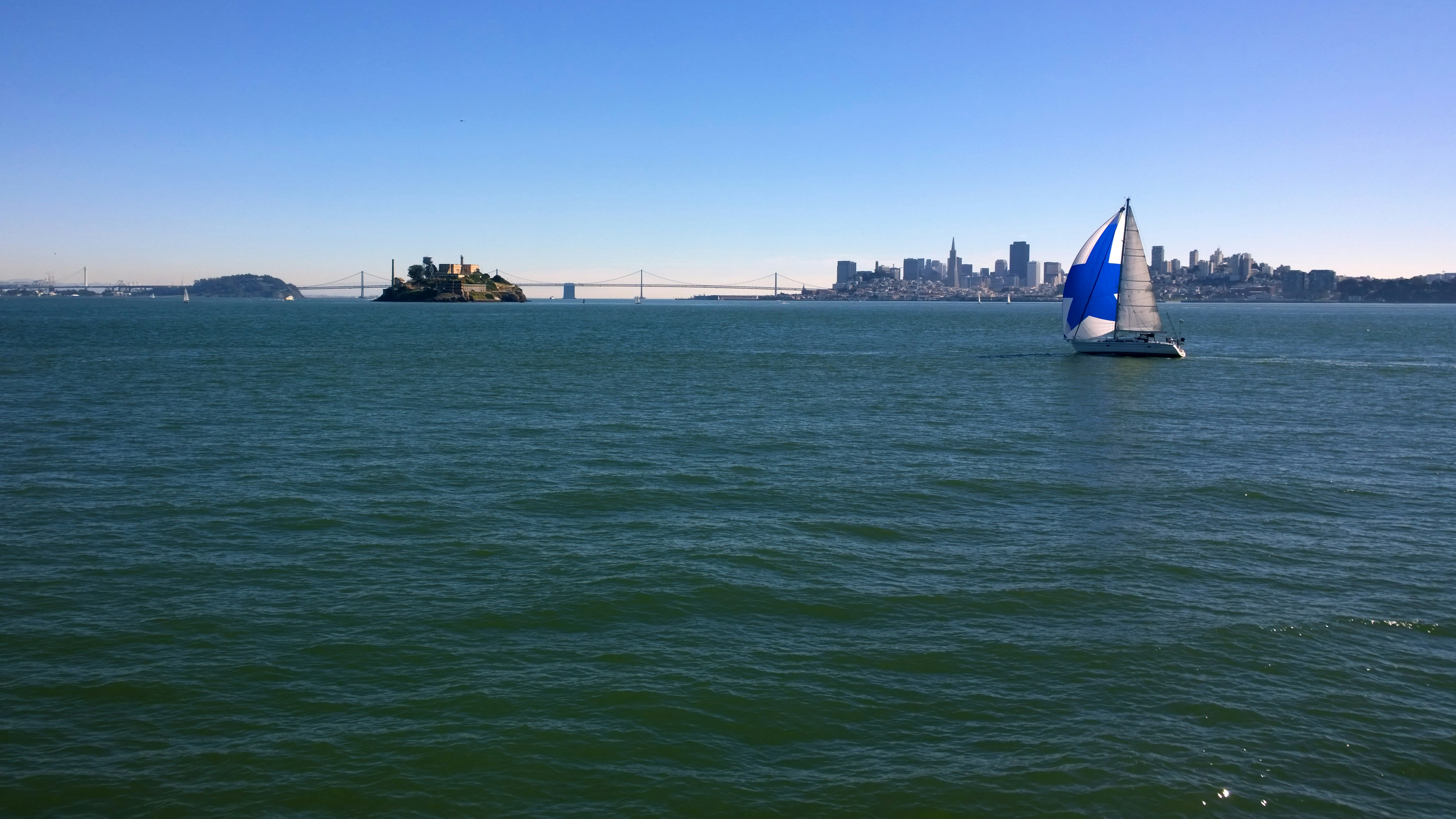 a sailboat in the middle of a large body of water