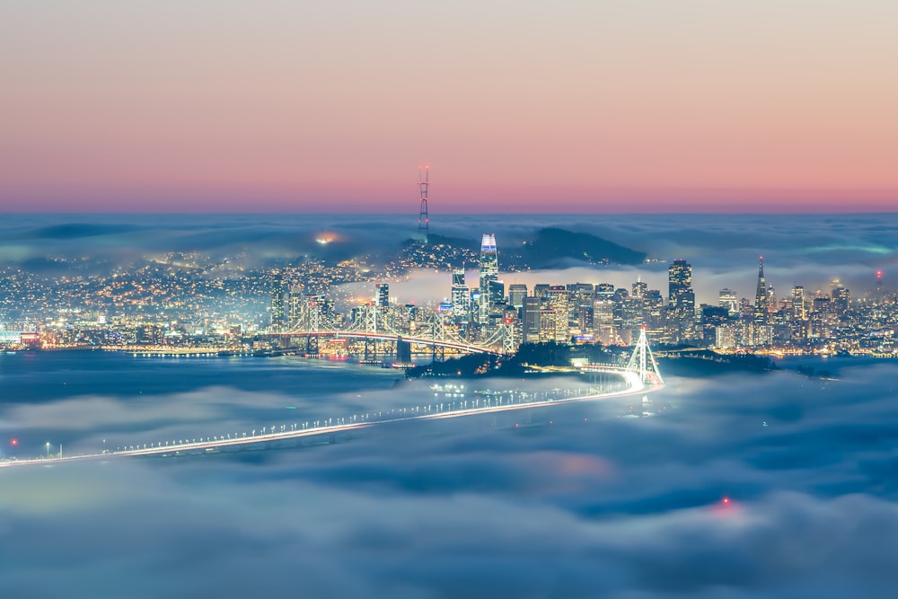 a view of a city from above the clouds