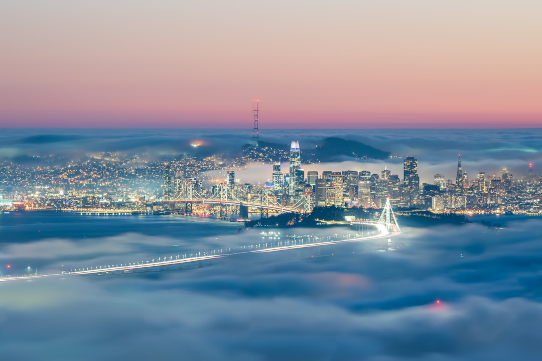 a view of a city from above the clouds,