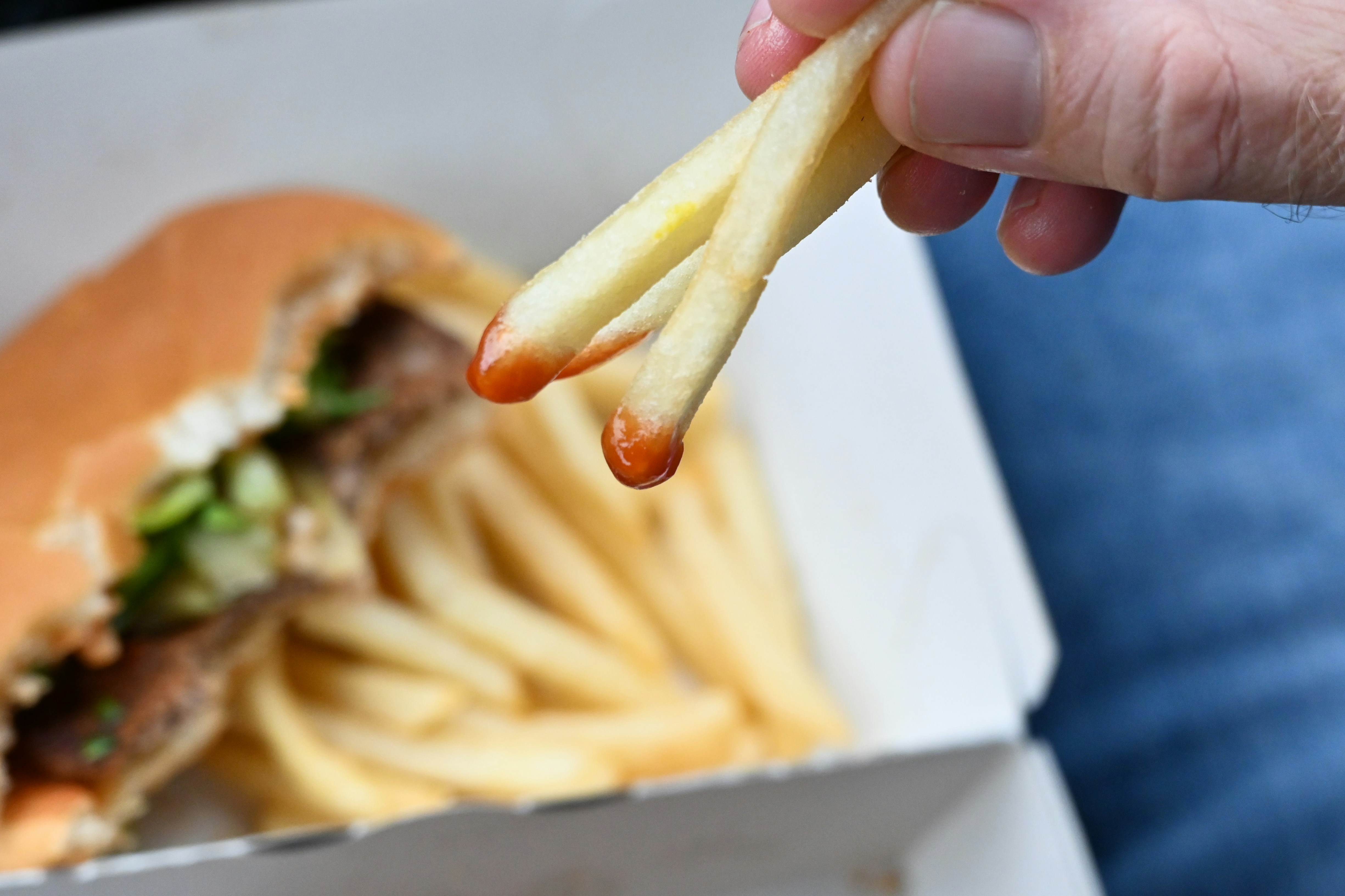 Fries dipped in sauce