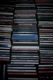 Compact discs neatly arranged in a grid layout