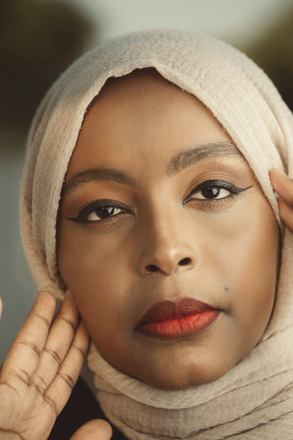 a woman with a towel on her head