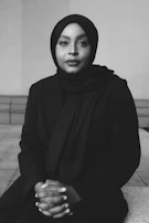 A serene portrait of Ameen Abdul reflecting commitment to humanitarian values.