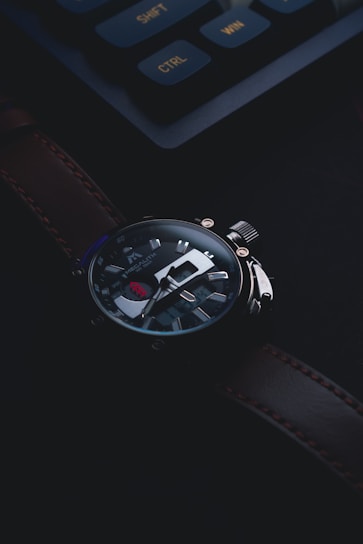 Close-up of a chardor luxury watch showcasing intricate dial details and polished case under soft lighting.