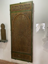 A beautifully restored wooden door showcasing rich, vibrant colors and textures.