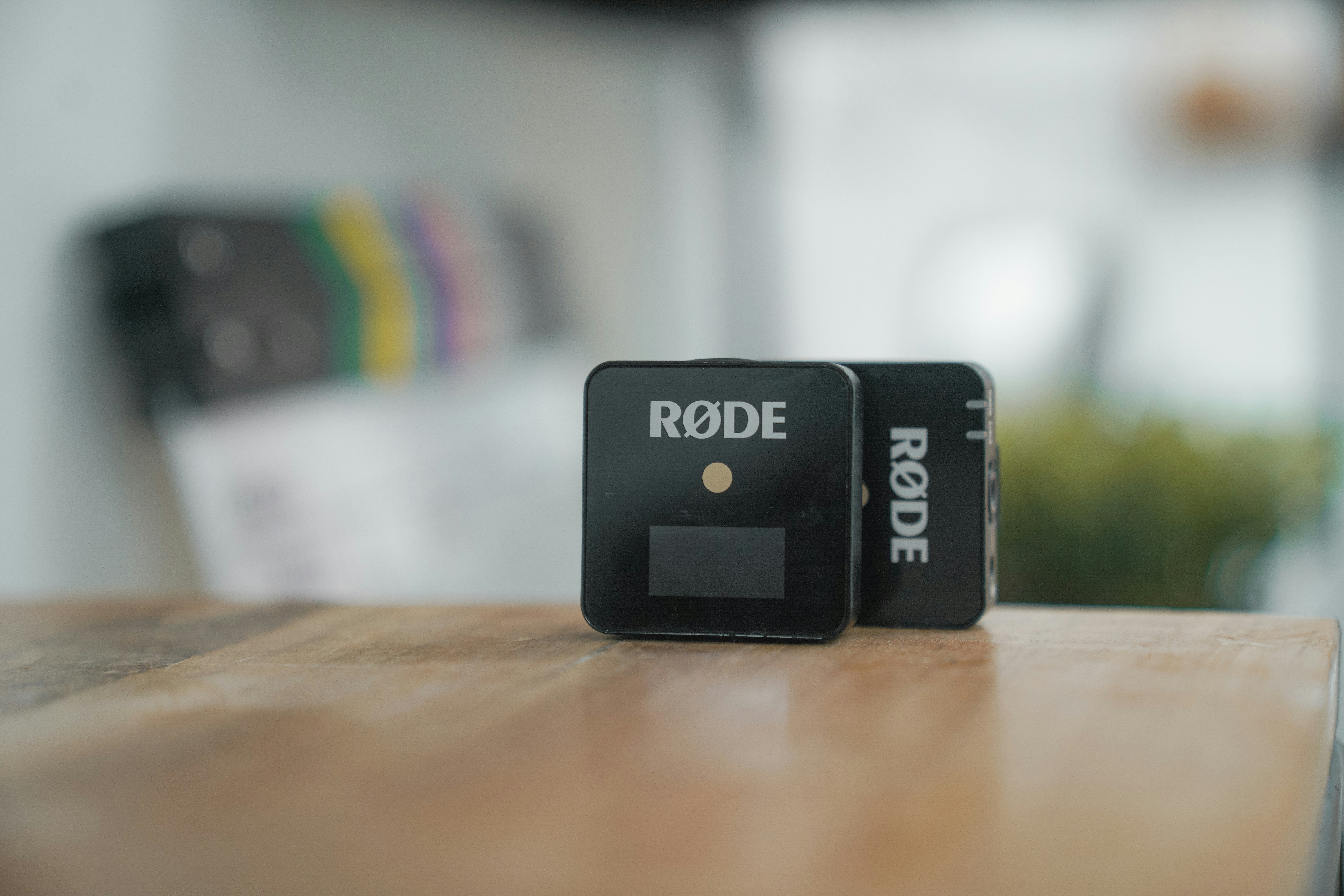 a close up of two electronic devices on a table
