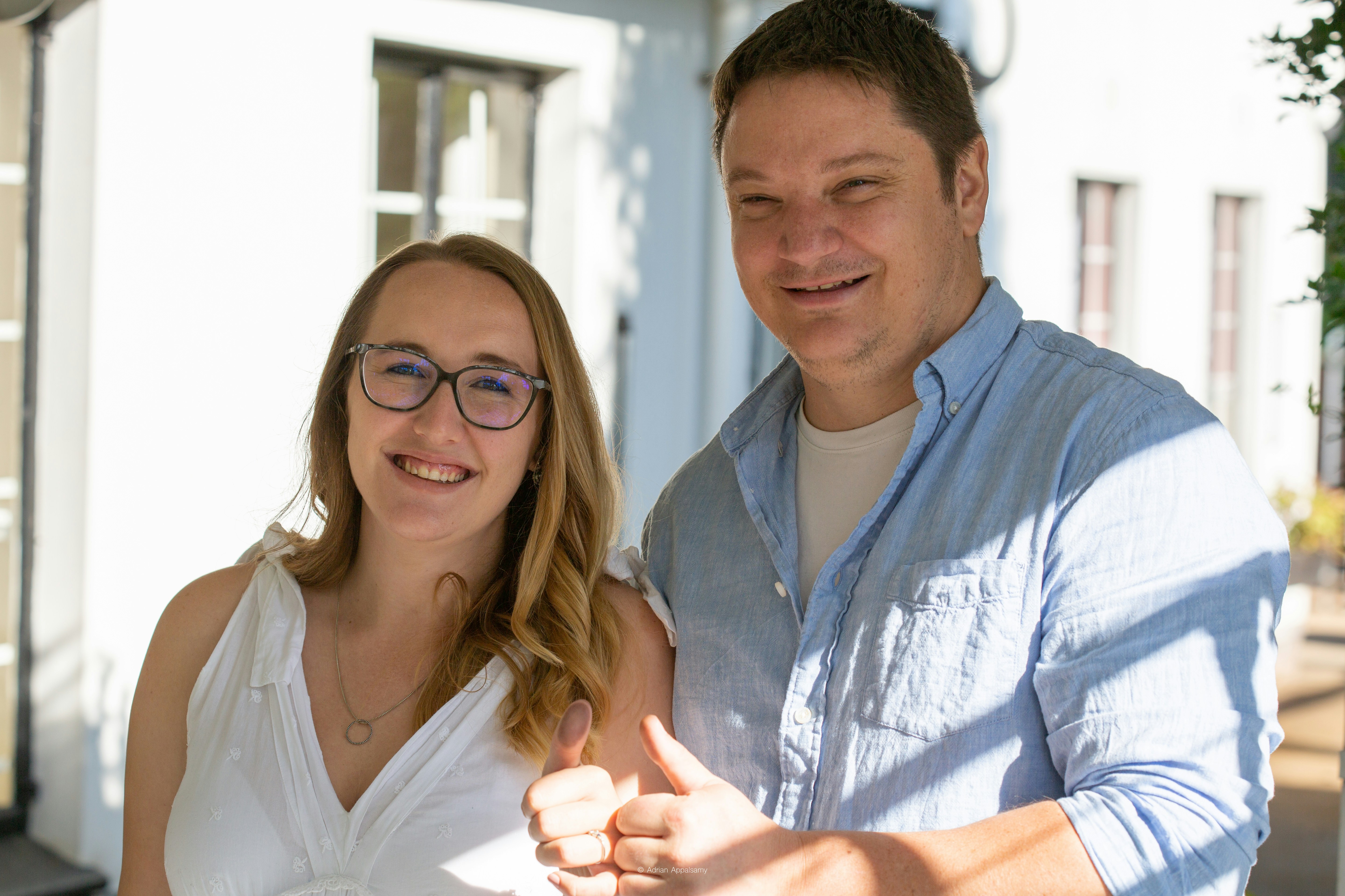 a man and a woman standing next to each other