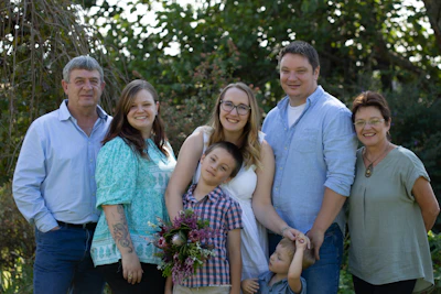 a group of people standing next to each other