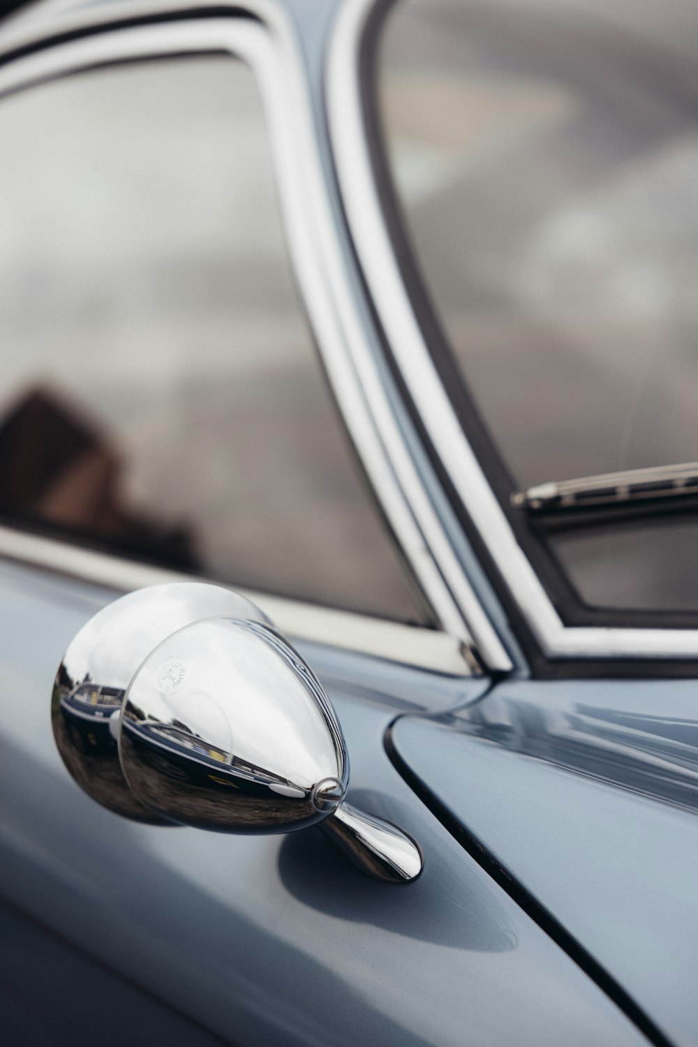 a close up of a car with a mirror on it