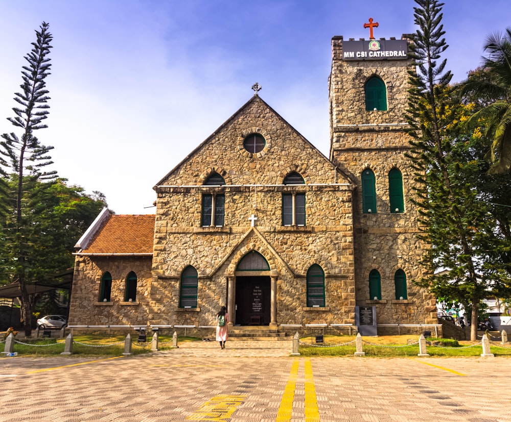 a large stone church with a clock tower