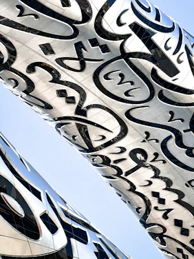 a close up of a building with a sky background