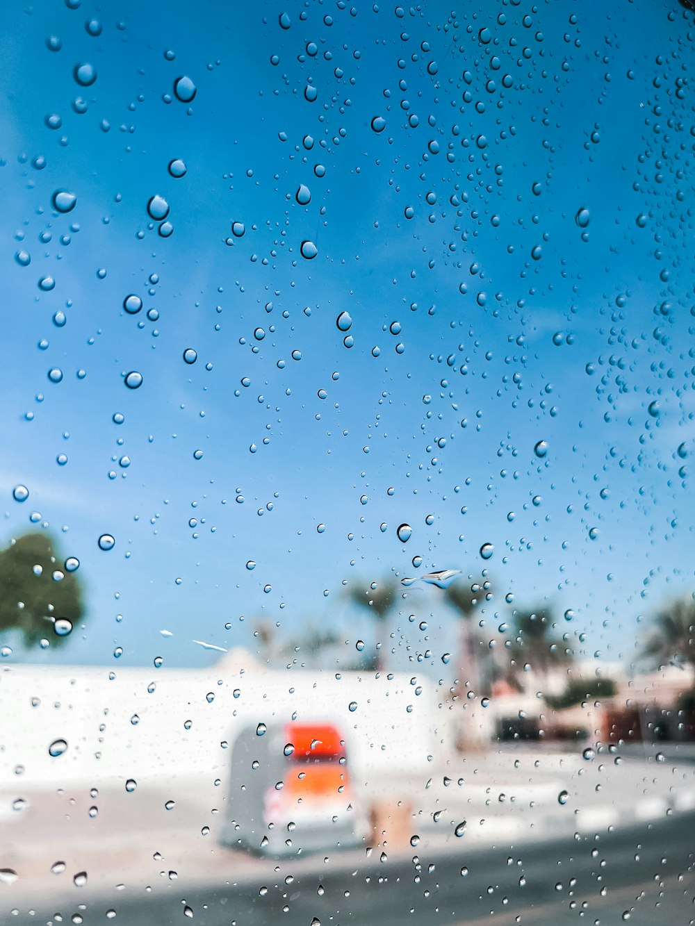 rain drops on the windshield of a car