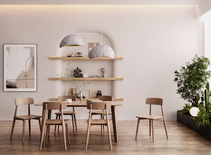 a dining room with a table and chairs