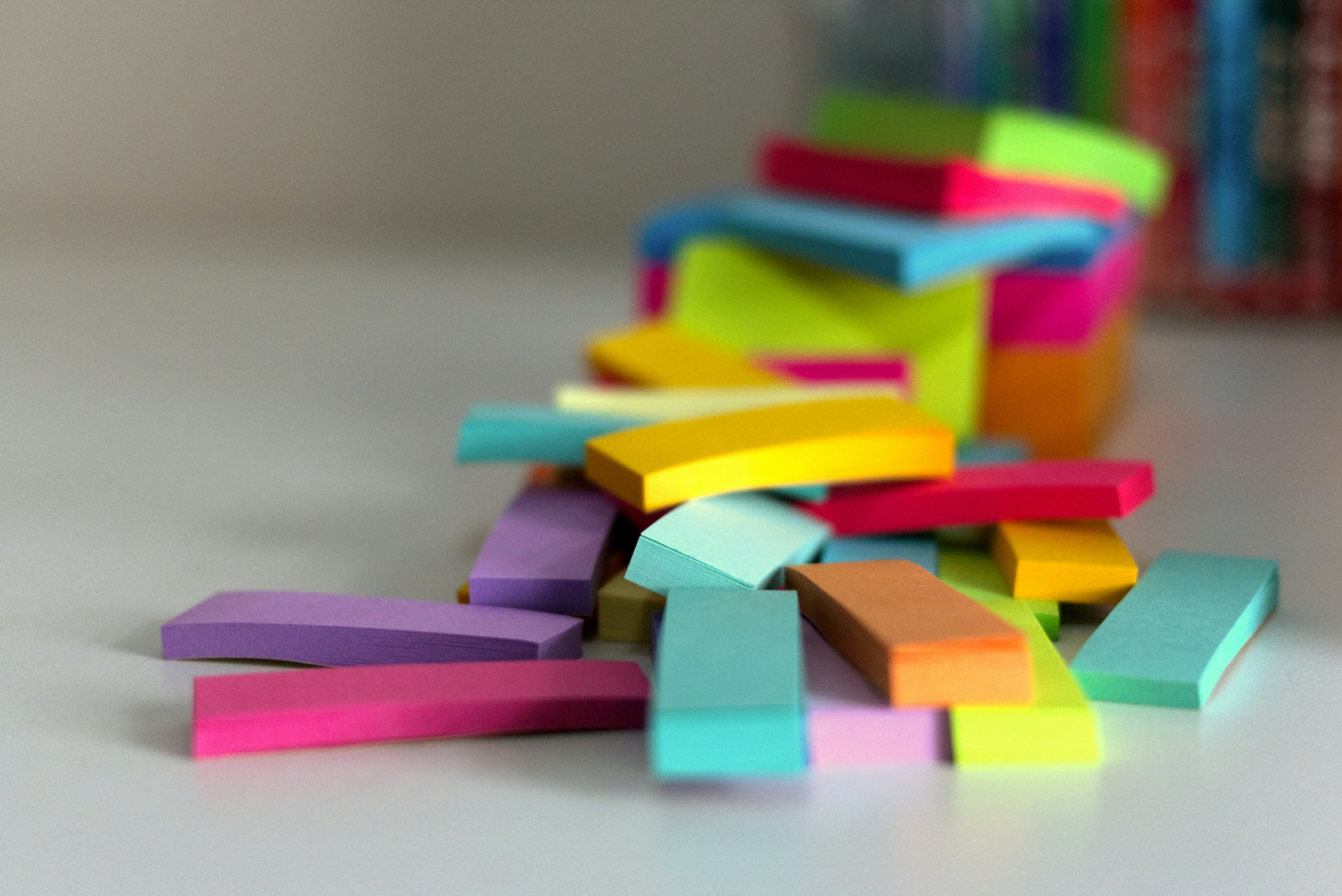 a pile of colored blocks sitting on top of a table