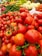 Close-up of fresh fruits and vegetables arranged in a market display.
