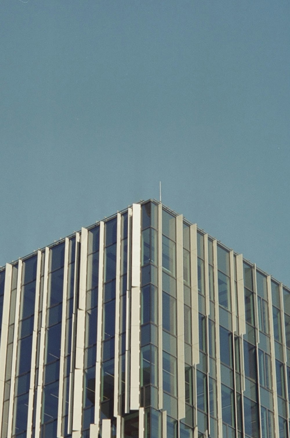 a large building with a clock on the top of it