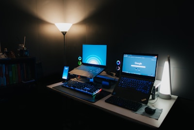 A cozy home study setup with a laptop showing an English lesson inspired by Stranger Things.