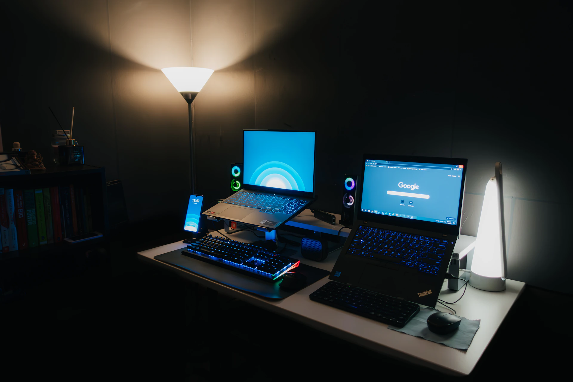 A friendly technician setting up a laptop in a cozy living room, with tools and devices neatly arranged nearby.