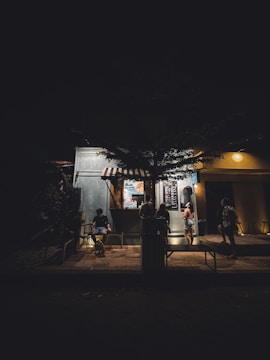 A cozy food stand with customers enjoying meals outdoors.