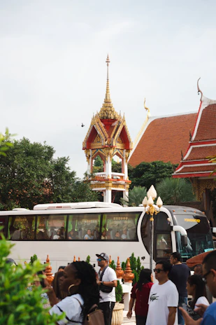 A luxurious black and gold themed tour brochure featuring iconic Thailand landmarks.