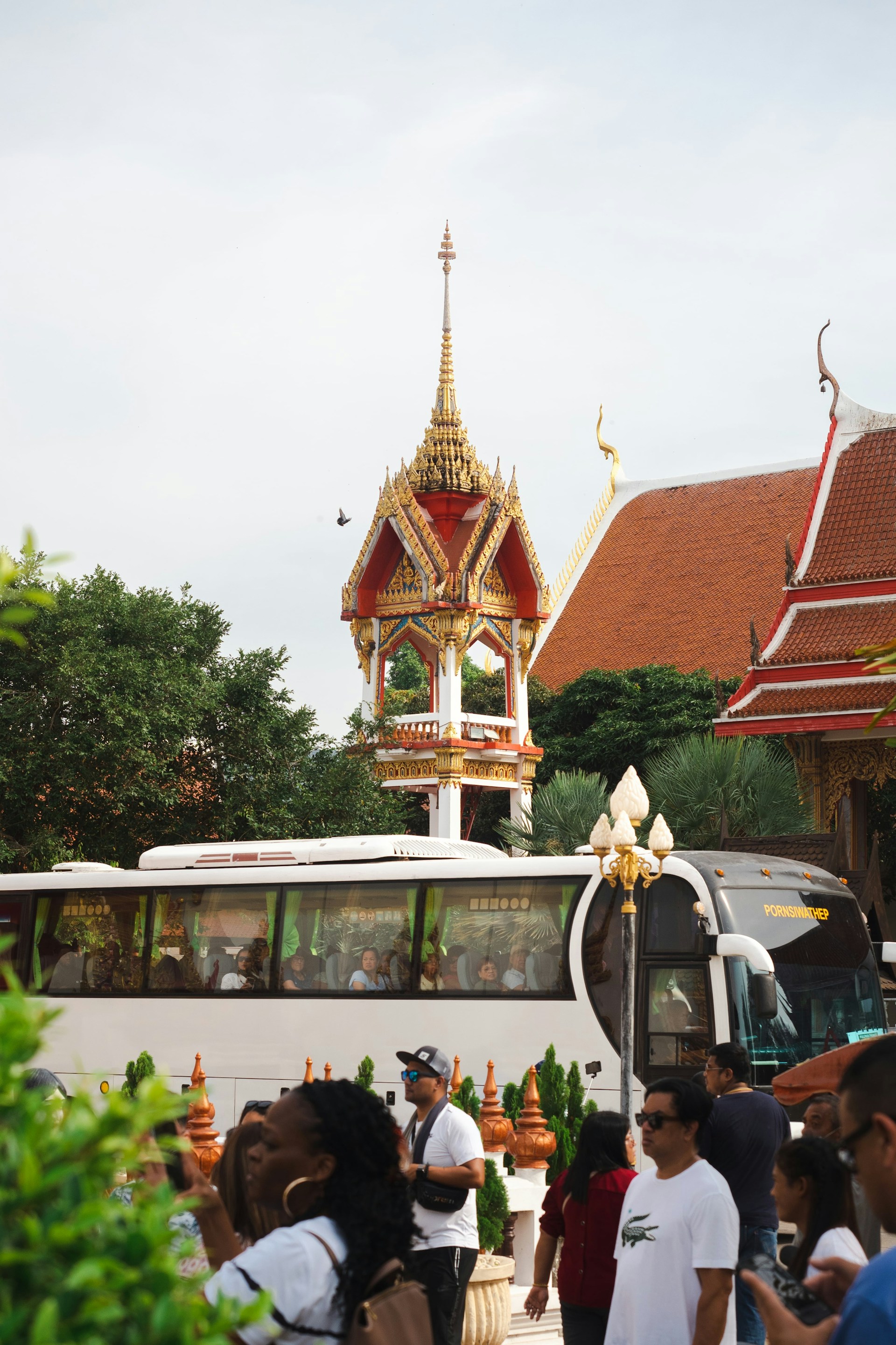 Excited tourists exploring the bustling streets of Bangkok, showcasing the lively international destinations featured in Golden Royal Holidays' itineraries.