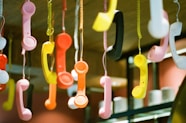 a bunch of telephones hanging from a ceiling