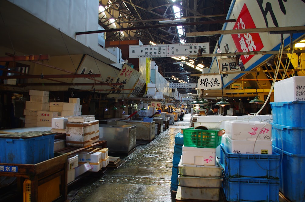 a warehouse filled with lots of boxes and containers