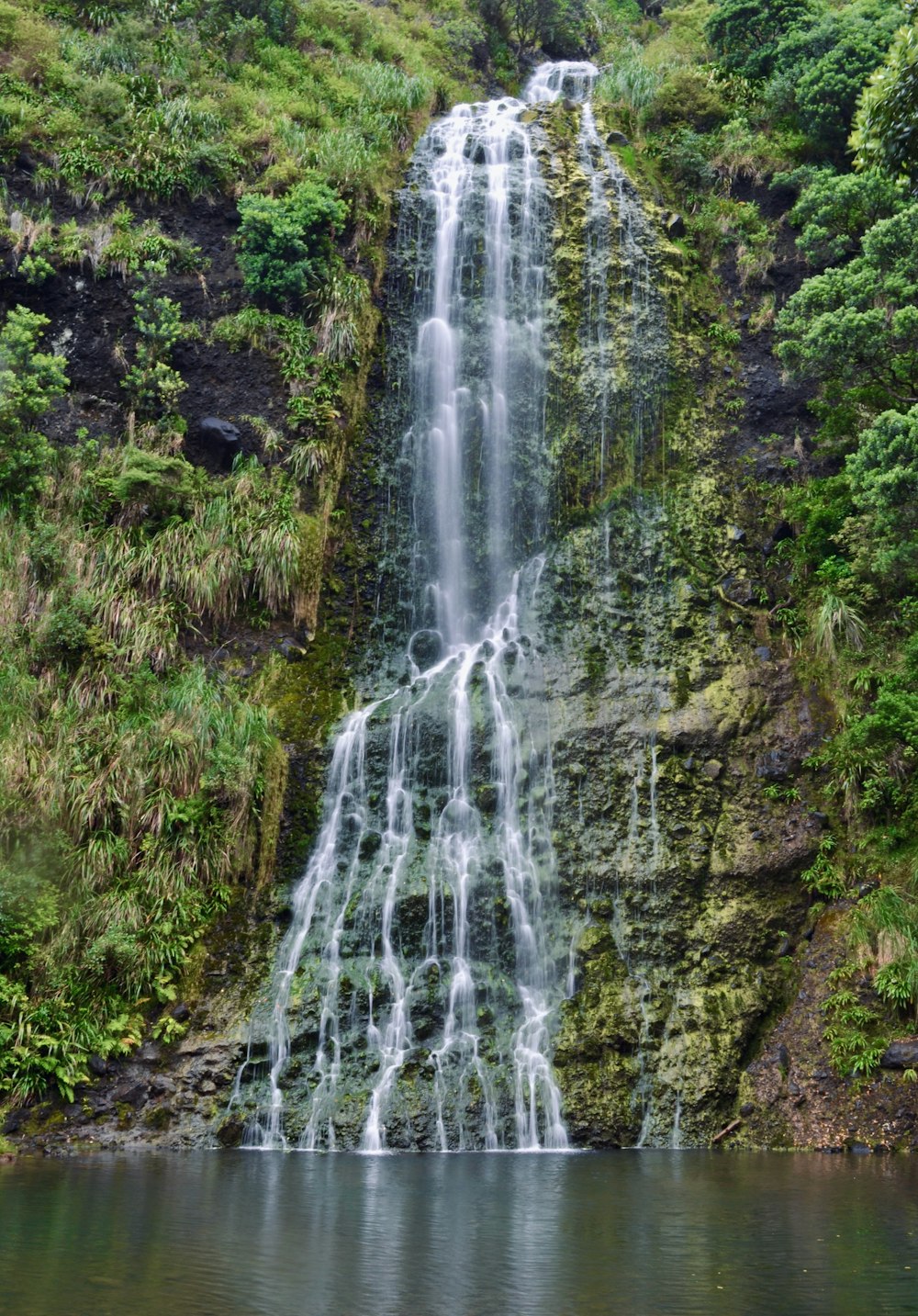 a large waterfall with lots of water coming out of it