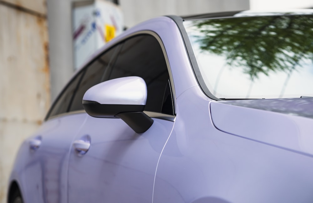 a close up of a car's side view mirror