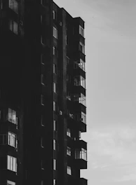 a black and white photo of a tall building