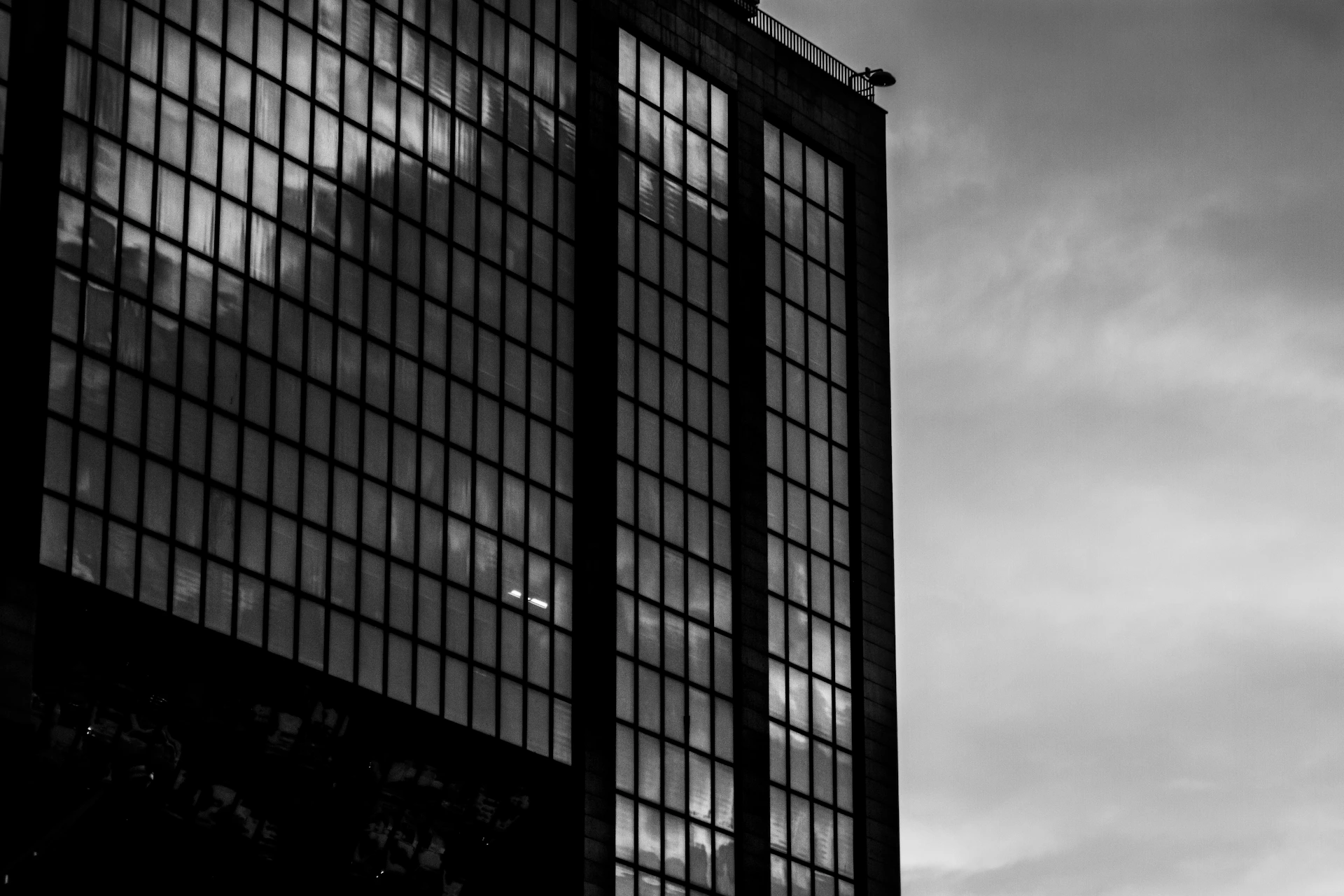 a black and white photo of a tall building
