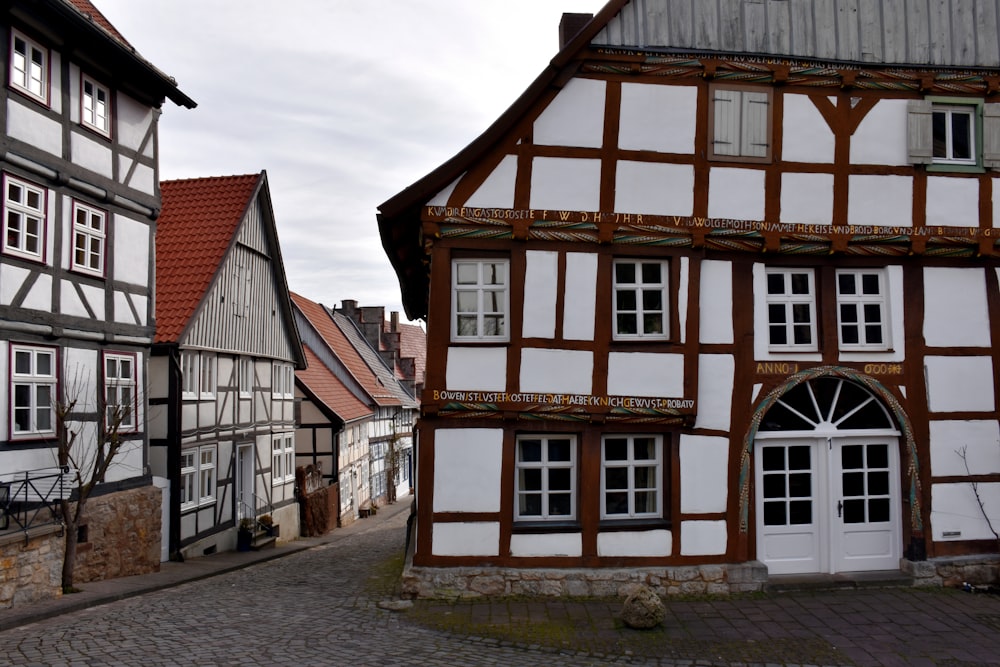 a cobblestone street lined with old buildings