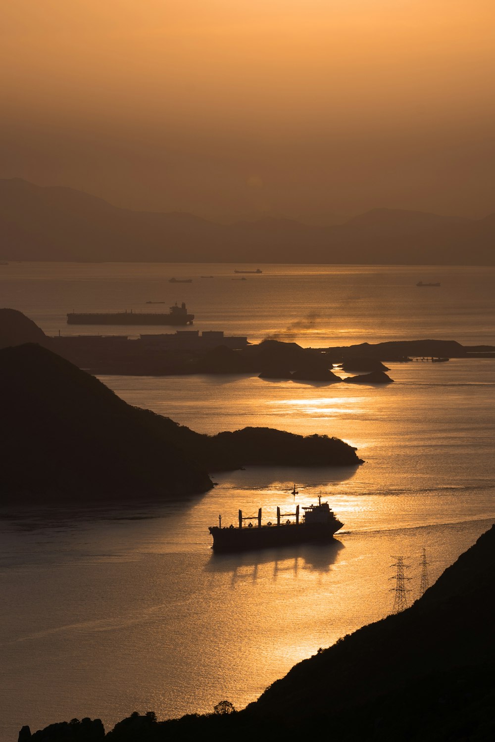 a large boat floating on top of a large body of water