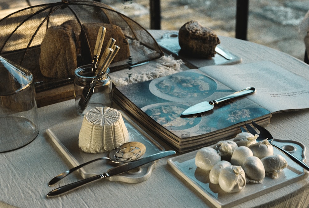 a table topped with lots of different types of food