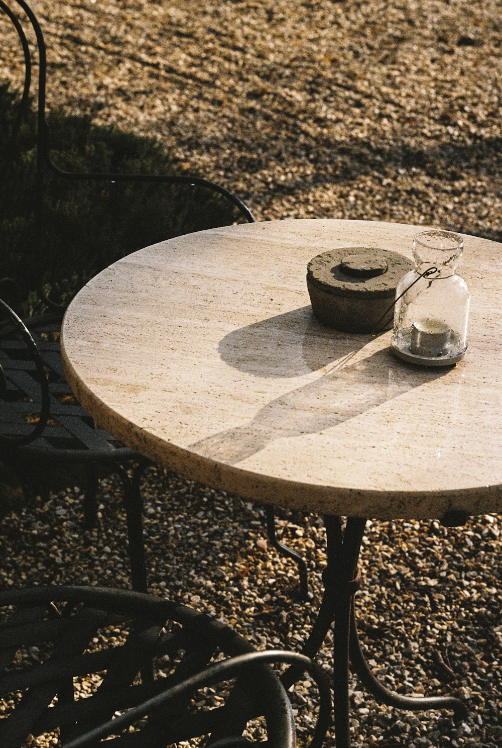 a table with a glass jar on top of it
