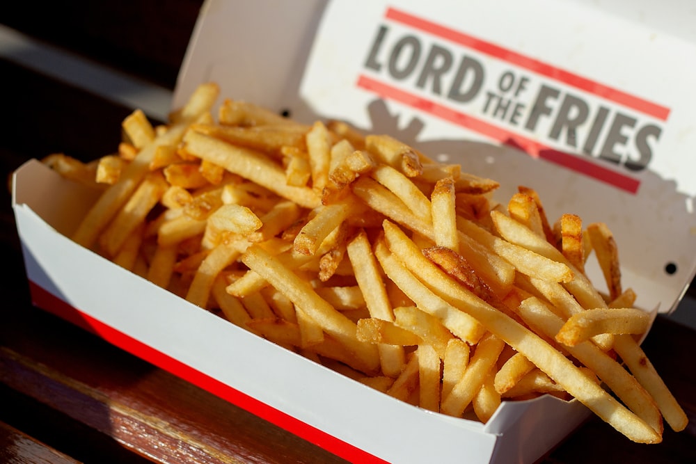 a close up of a box of french fries