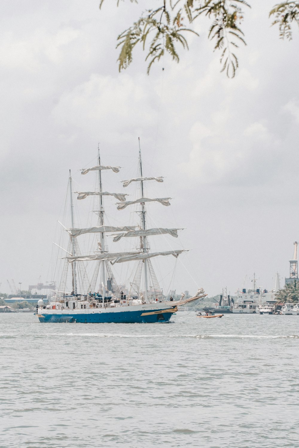 a large sailboat in a body of water