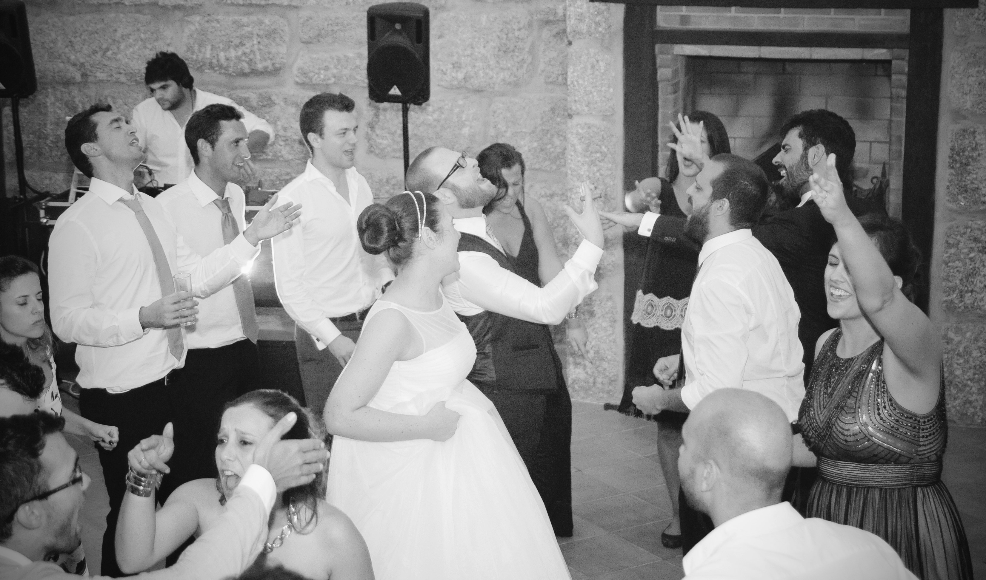 Guests dancing joyfully on dance floor