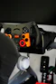 A high-quality simracing setup featuring a racing wheel and pedals.
