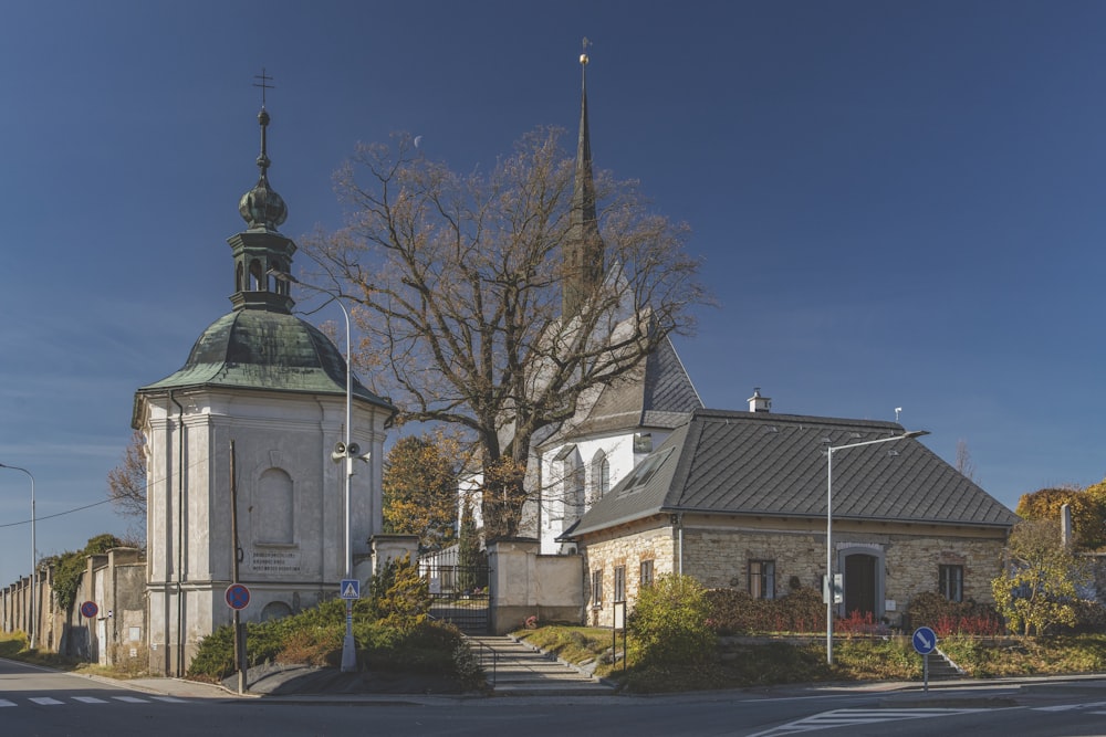 a church with a steeple and a steeple clock tower