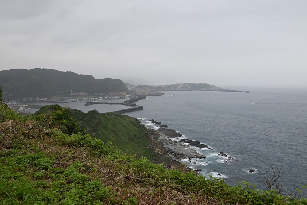 a view of the ocean from a hill