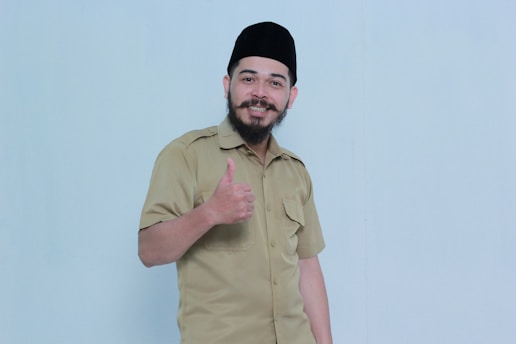 A man proudly sporting a mustache in support of Movember.